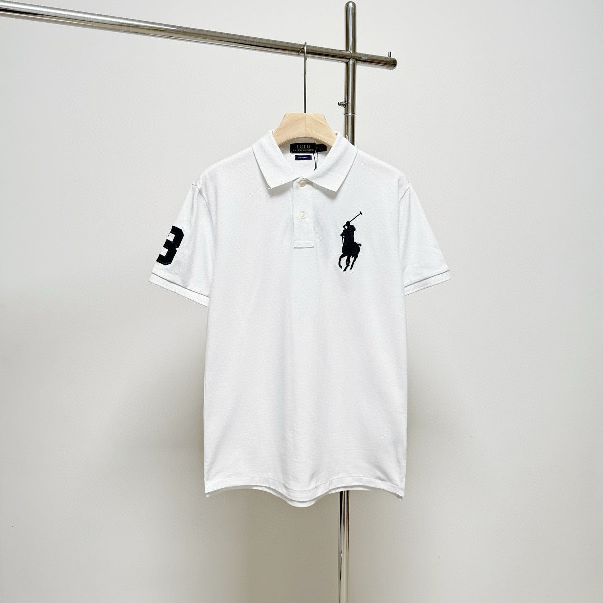 RL polo shirt with embroidered horse logo on the collar
